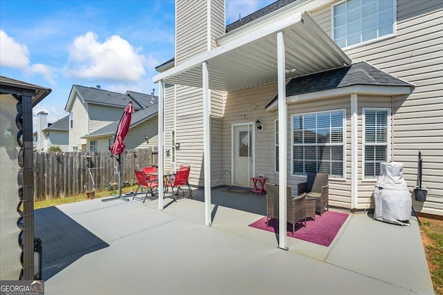 view of patio / terrace with fence