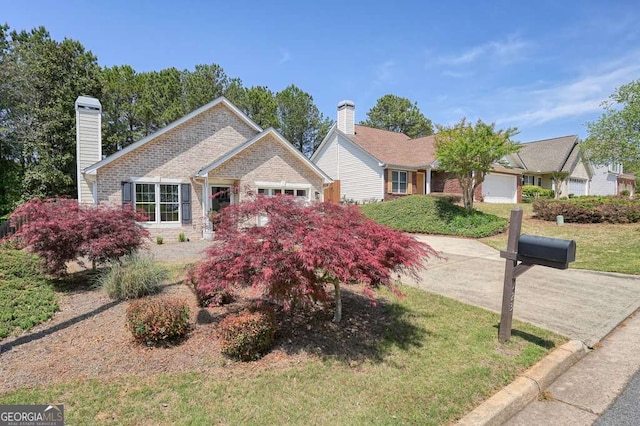 ranch-style house with a chimney and a front yard