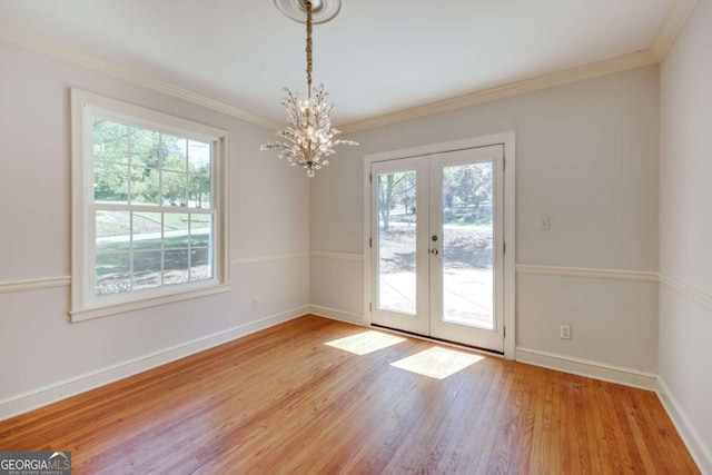490 Mcwhorter Dr, Athens, GA 30606 - spare room with french doors, plenty of natural light, light wood-type flooring, and ornamental molding