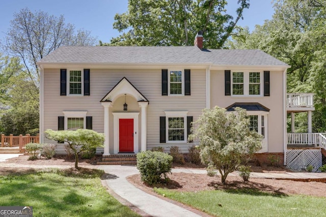 490 Mcwhorter Dr, Athens, GA 30606 - colonial house with a chimney, a front yard, and a shingled roof