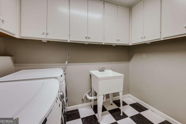490 Mcwhorter Dr, Athens, GA 30606 - laundry room featuring separate washer and dryer, tile patterned floors, and cabinet space
