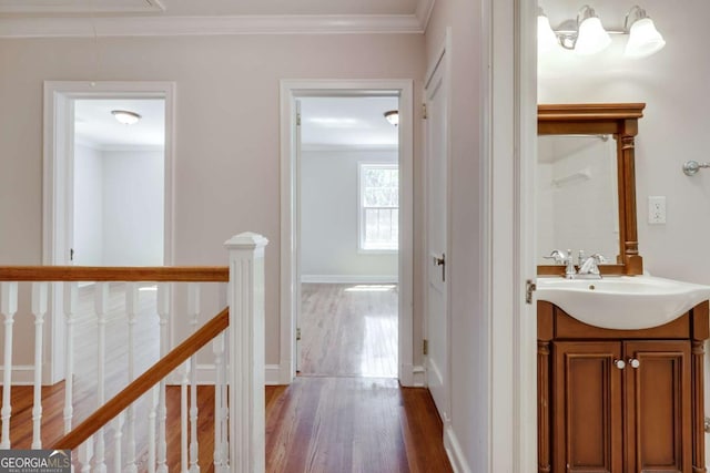 490 Mcwhorter Dr, Athens, GA 30606 - hall with an upstairs landing, wood finished floors, and ornamental molding
