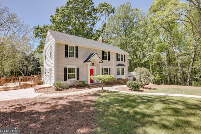 490 Mcwhorter Dr, Athens, GA 30606 - colonial home with a chimney, a wooden deck, a front yard, and driveway