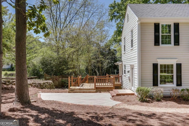 490 Mcwhorter Dr, Athens, GA 30606 - view of side of home with a wooden deck, a patio, and a shingled roof