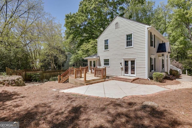 490 Mcwhorter Dr, Athens, GA 30606 - rear view of house with french doors, a deck, view of wooded area, and a patio area