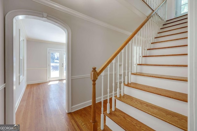 490 Mcwhorter Dr, Athens, GA 30606 - stairway with ornamental molding, wood finished floors, and arched walkways