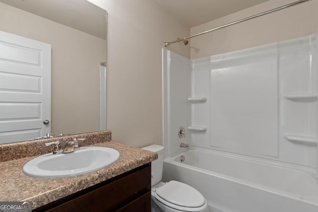 full bath featuring toilet, vanity, and shower / tub combination
