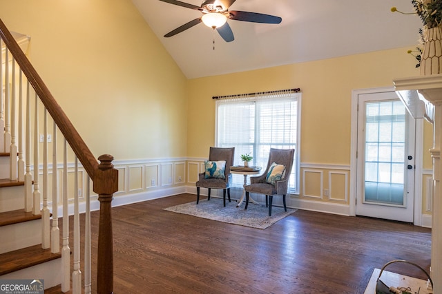 109 Trudie Ln, Macon, GA 31216 - living area featuring plenty of natural light, a decorative wall, wood finished floors, a ceiling fan, and a wainscoted wall
