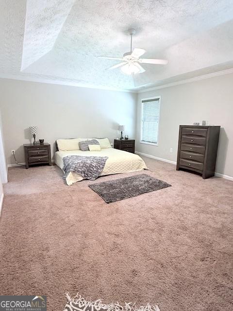 622 River Rock Cir, Jefferson, GA 30549 - carpeted bedroom featuring a textured ceiling, ornamental molding, baseboards, and ceiling fan