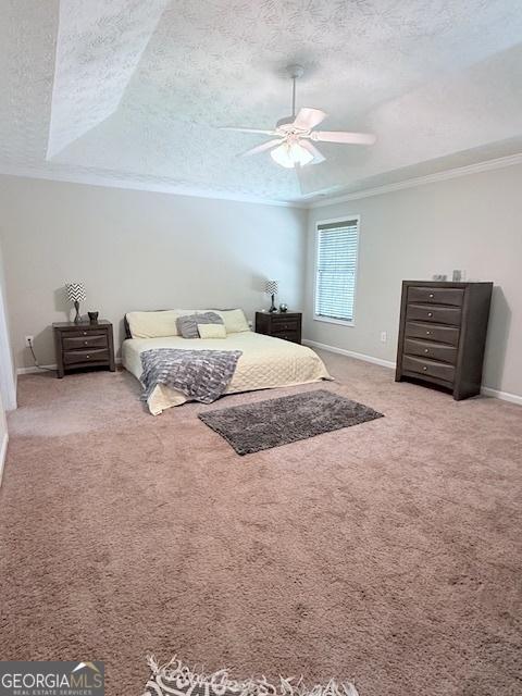 622 River Rock Cir, Jefferson, GA 30549 - carpeted bedroom featuring crown molding, a textured ceiling, baseboards, and ceiling fan