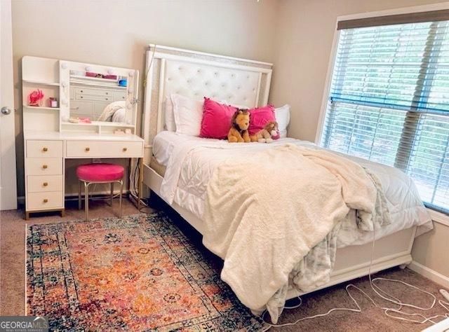 622 River Rock Cir, Jefferson, GA 30549 - carpeted bedroom featuring baseboards