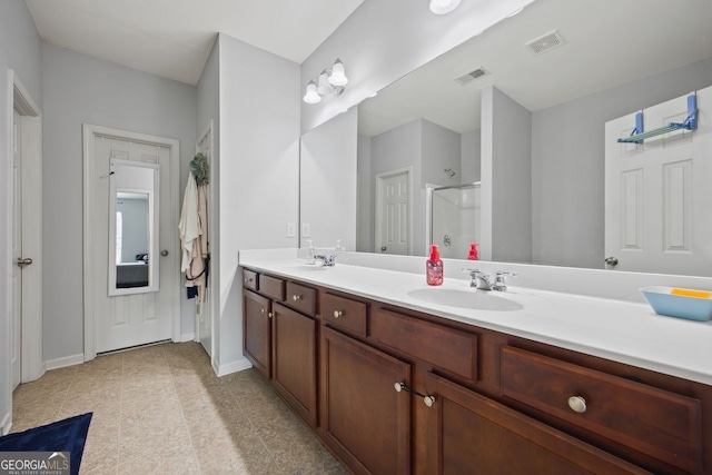 3203 Cyrus Point Ln, Kennesaw, GA 30152 - full bathroom with a stall shower, double vanity, baseboards, and tile patterned floors