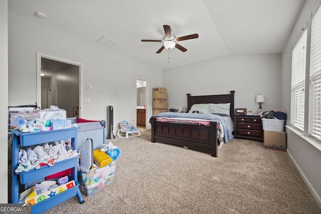 3203 Cyrus Point Ln, Kennesaw, GA 30152 - bedroom with carpet, multiple windows, lofted ceiling, connected bathroom, and ceiling fan