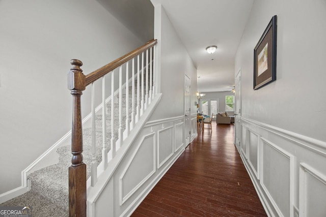 3203 Cyrus Point Ln, Kennesaw, GA 30152 - hall with a decorative wall, stairs, a wainscoted wall, and wood-type flooring