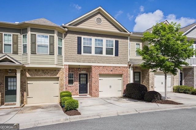 3203 Cyrus Point Ln, Kennesaw, GA 30152 - multi unit property featuring concrete driveway, brick siding, and a garage