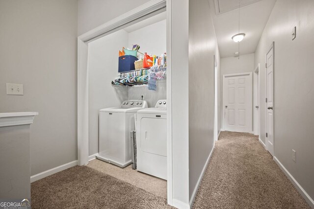 3203 Cyrus Point Ln, Kennesaw, GA 30152 - clothes washing area with attic access, washer and clothes dryer, light colored carpet, and baseboards