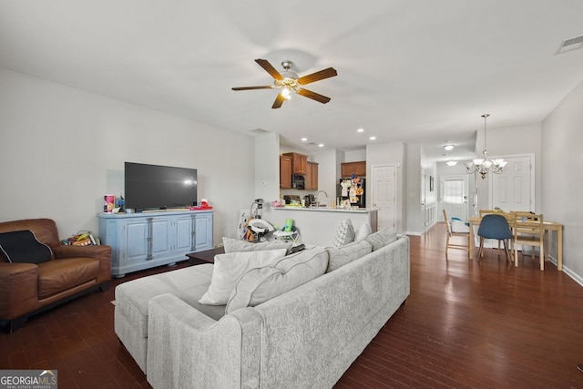 3203 Cyrus Point Ln, Kennesaw, GA 30152 - living room featuring a chandelier, a ceiling fan, dark wood-type flooring, baseboards, and recessed lighting