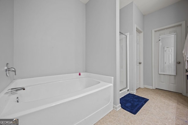 3203 Cyrus Point Ln, Kennesaw, GA 30152 - full bathroom with a garden tub, a stall shower, tile patterned floors, and baseboards