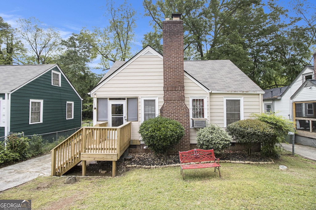 1798 Alvarado Ter SW, Atlanta, GA 30310 - rear view of house featuring a chimney, a yard, and roof with shingles