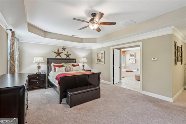 6565 Bentley Ridge Dr, Cumming, GA 30040 - bedroom featuring carpet floors, ornamental molding, a tray ceiling, ensuite bathroom, and ceiling fan