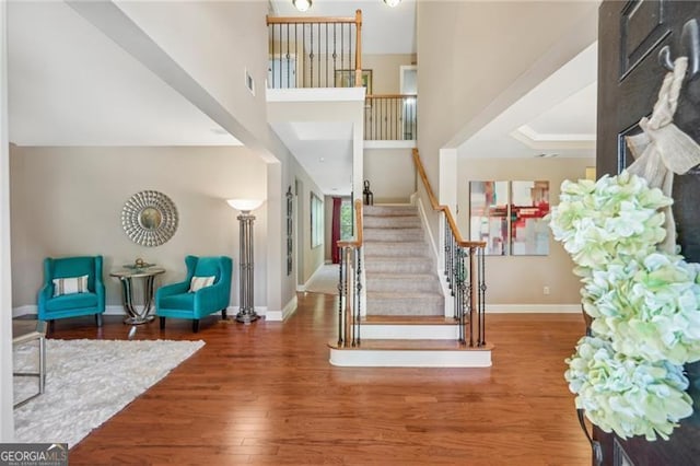 6565 Bentley Ridge Dr, Cumming, GA 30040 - foyer featuring stairway and wood finished floors