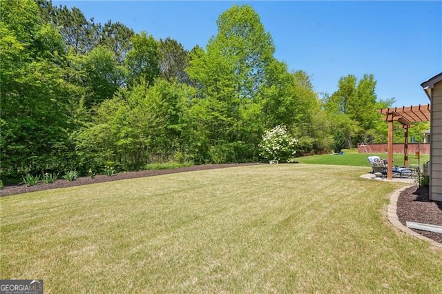 6565 Bentley Ridge Dr, Cumming, GA 30040 - view of grassy yard featuring a pergola