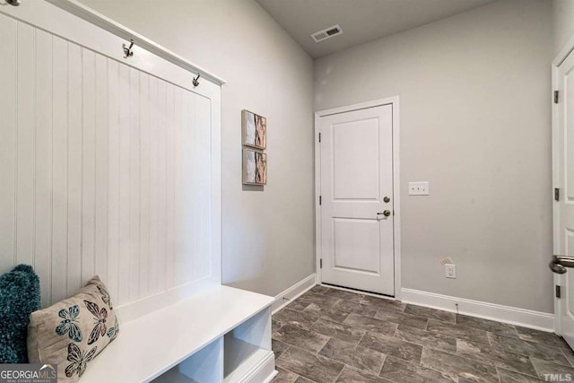 mudroom featuring baseboards and visible vents