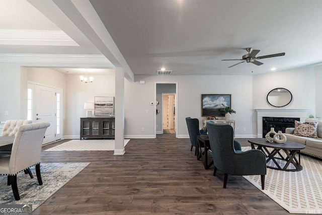 dining space with baseboards, visible vents, and a fireplace