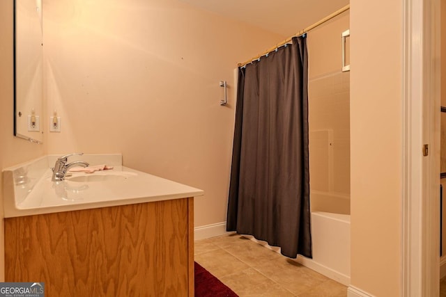 full bathroom featuring vanity, baseboards, tile patterned flooring, and shower / bathtub combination with curtain