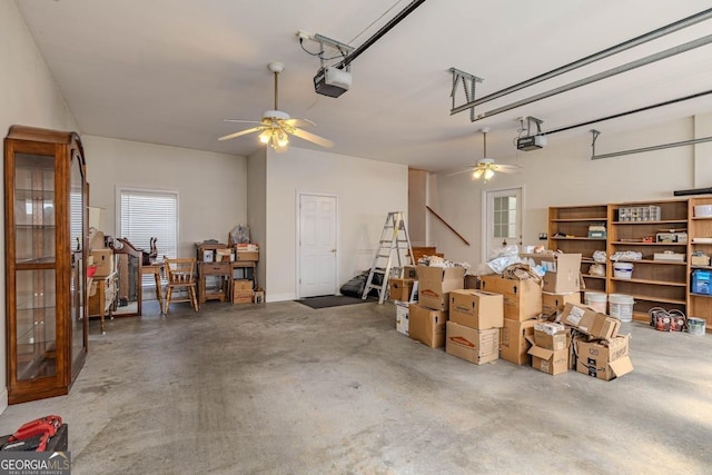 garage featuring a ceiling fan and a garage door opener