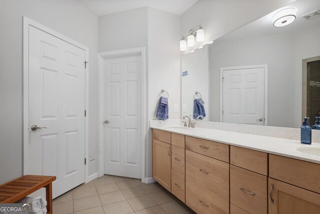 123 Heritage Pointe, Woodstock, GA 30189 - bathroom with tile patterned floors and double vanity