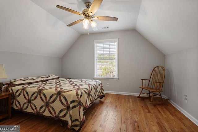 123 Heritage Pointe, Woodstock, GA 30189 - bedroom featuring wood finished floors, lofted ceiling, ceiling fan, and baseboards
