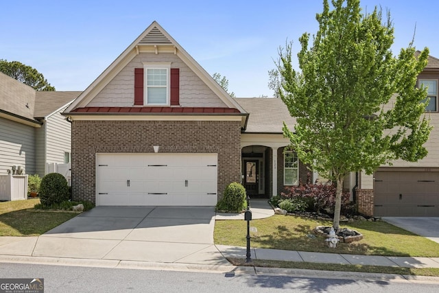 123 Heritage Pointe, Woodstock, GA 30189 - traditional-style home featuring brick siding, concrete driveway, a standing seam roof, and a front yard