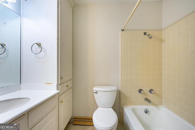 full bathroom featuring toilet, vanity, and bathtub / shower combination