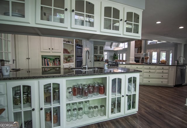 interior space with an outdoor bar, a sink, and french doors
