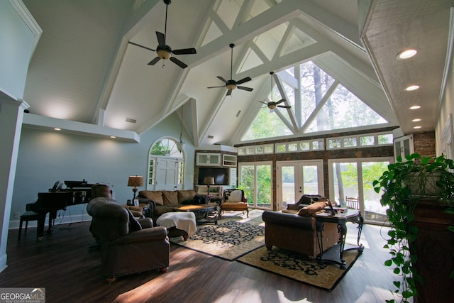 living area with recessed lighting, wood finished floors, a ceiling fan, beamed ceiling, and high vaulted ceiling