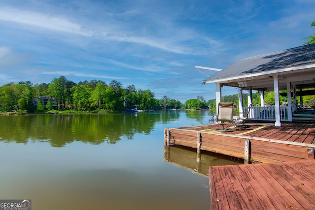 dock area with a water view