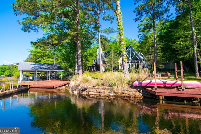 view of dock with a water view