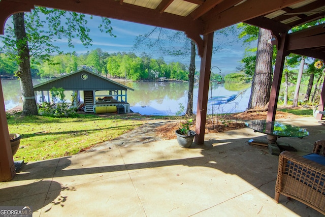 view of patio / terrace with a water view