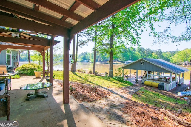 view of patio featuring a water view