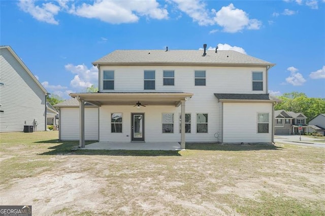 rear view of property featuring a ceiling fan, a patio, and central AC unit