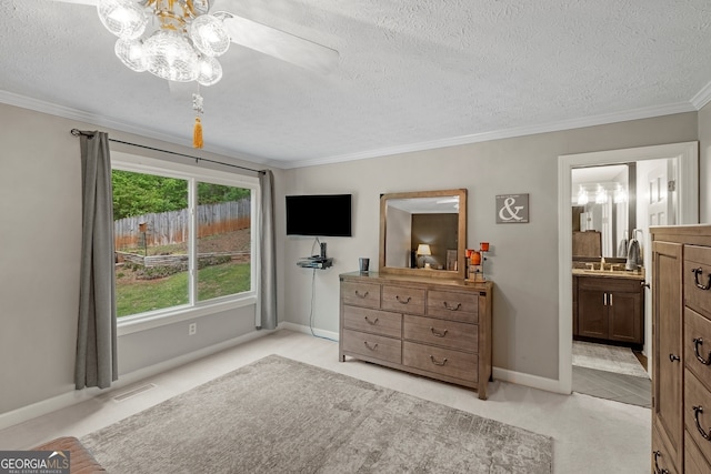 bedroom with light carpet, baseboards, visible vents, a textured ceiling, and crown molding