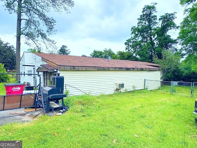 2831 Kent Dr, Macon, GA 31206 - view of side of home with fence and a lawn