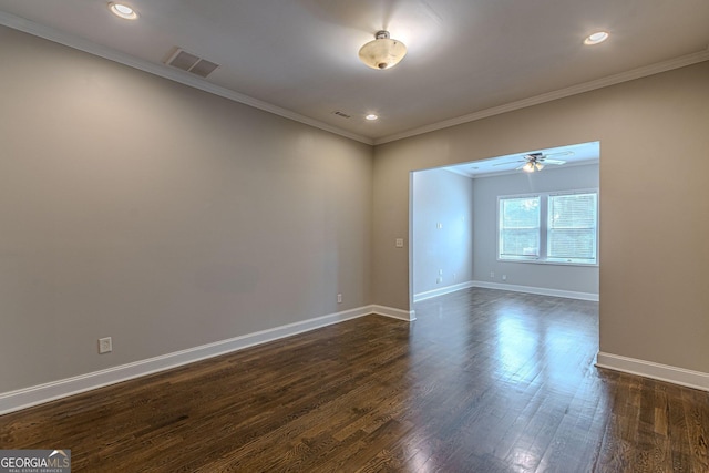 683 Pryor St SW Unit C, Atlanta, GA 30315 - spare room with visible vents, a ceiling fan, crown molding, baseboards, and dark wood-style flooring
