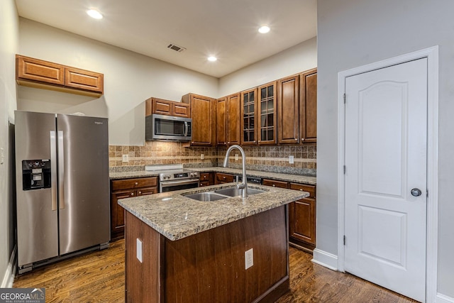 683 Pryor St SW Unit C, Atlanta, GA 30315 - kitchen with dark wood-style flooring, tasteful backsplash, stainless steel appliances, and a sink