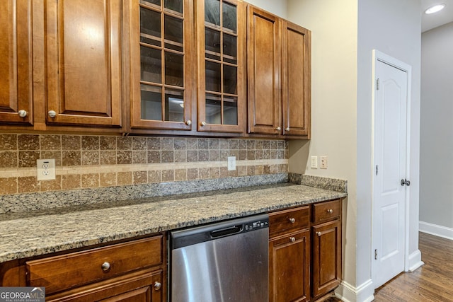 683 Pryor St SW Unit C, Atlanta, GA 30315 - kitchen featuring glass insert cabinets, stainless steel dishwasher, baseboards, and tasteful backsplash