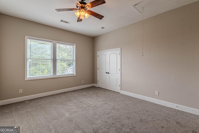 683 Pryor St SW Unit C, Atlanta, GA 30315 - carpeted spare room featuring attic access, baseboards, visible vents, and a ceiling fan