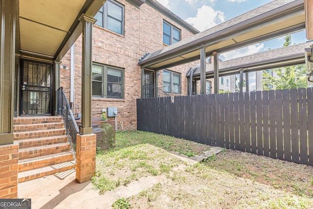 683 Pryor St SW Unit C, Atlanta, GA 30315 - view of side of property featuring brick siding and fence