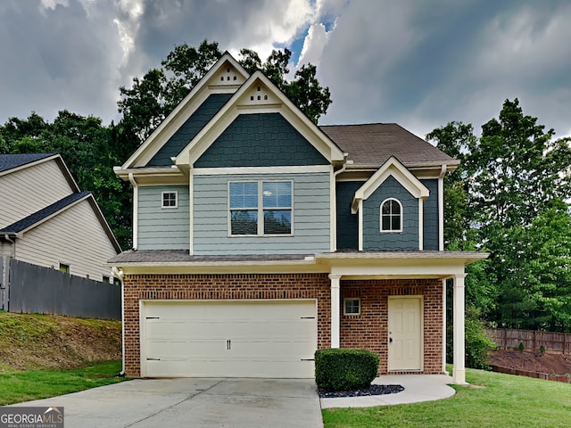 1162 Ida Woods Ln Unit 23, Lawrenceville, GA 30045 - craftsman-style house featuring a garage, brick siding, and driveway