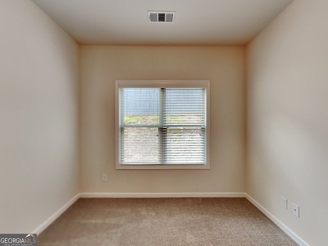 1162 Ida Woods Ln Unit 23, Lawrenceville, GA 30045 - carpeted spare room featuring baseboards